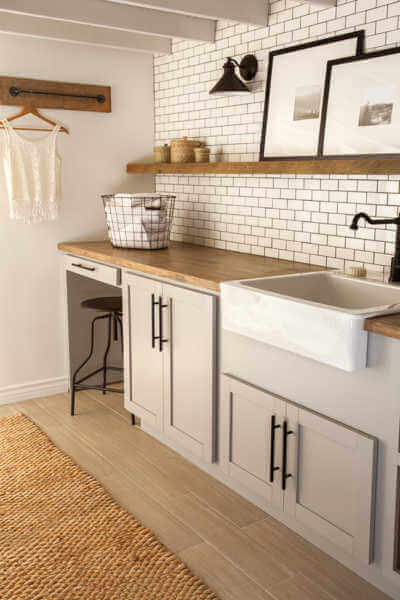 Laundry room with wood countertops