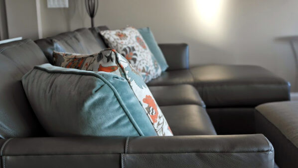 horizon_leather_sectional_colorful_pillows