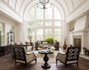 Traditional room with wood accent chairs