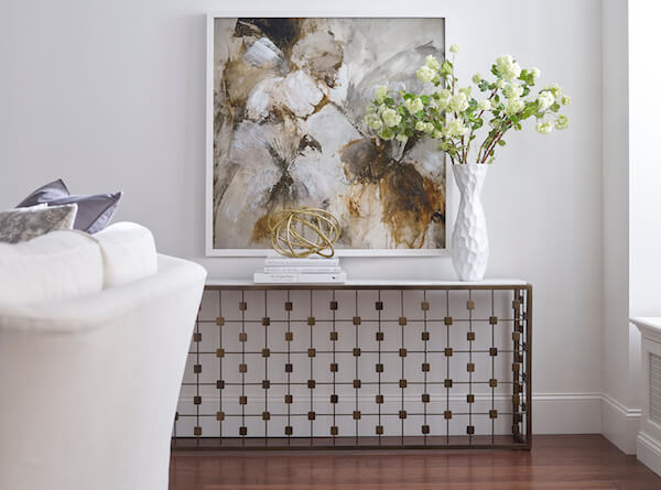 console table flowers and art